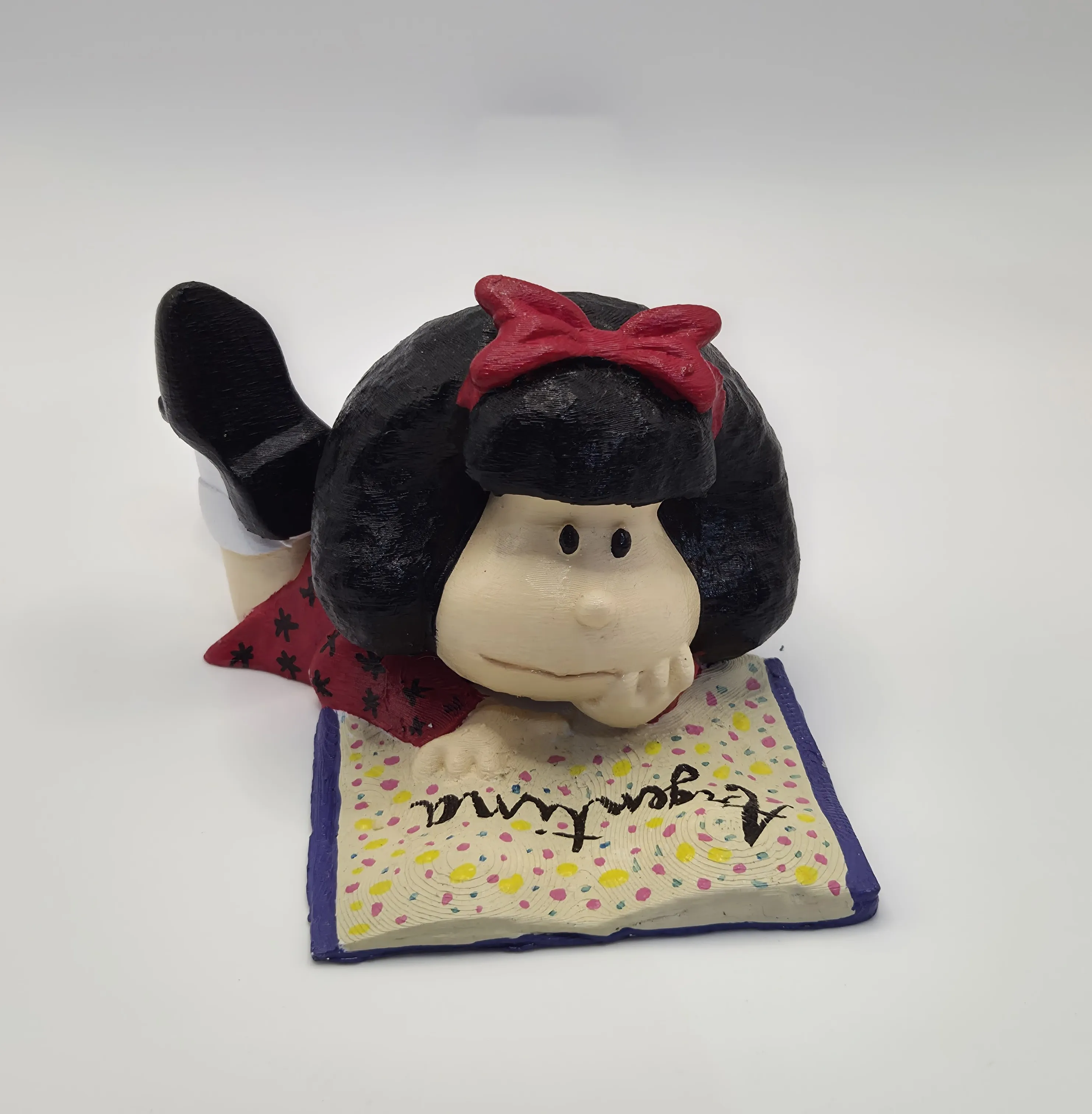 Mafalda Leyendo